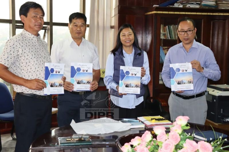Advisor Hekani Jakhalu unveiled the inaugural edition of the annual magazine of the Industries & Commerce Department on September 25. (DIPR Photo)